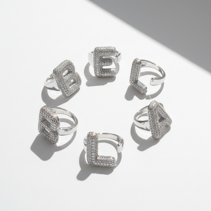 Anello color Argento con Iniziale in Acciaio Inox e Zirconi - Regolabile