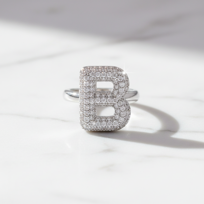 Anello color Argento con Iniziale in Acciaio Inox e Zirconi - Regolabile