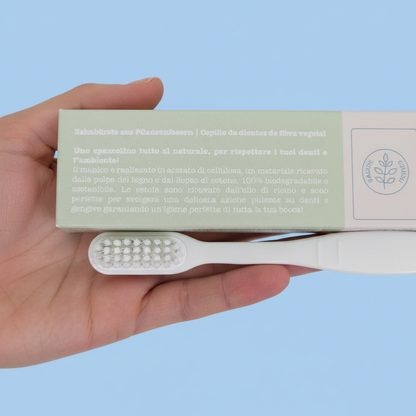 Spazzolino setole medie con testina intercambiabile